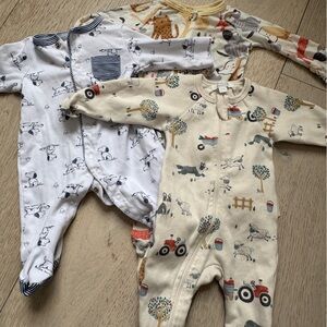Newborn dog themed onesies